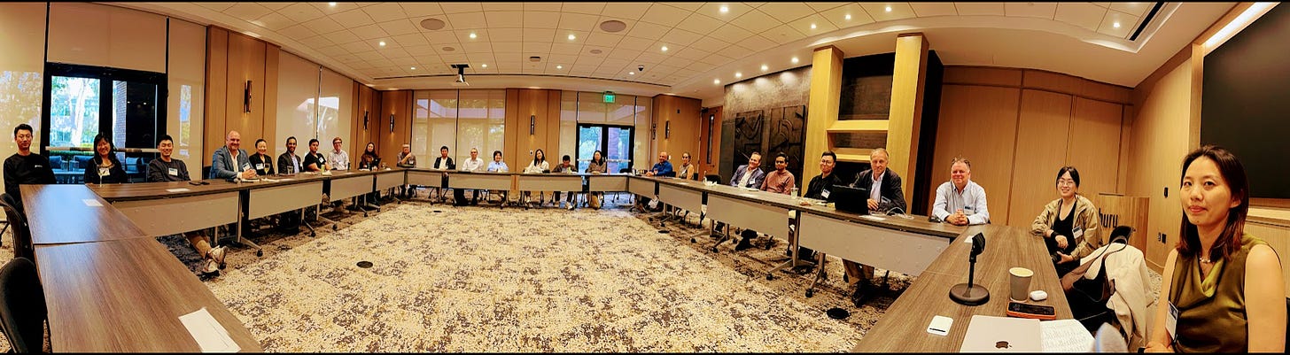 Panoramic view of the roundtable in session at Pillsbury's Silicon Valley office